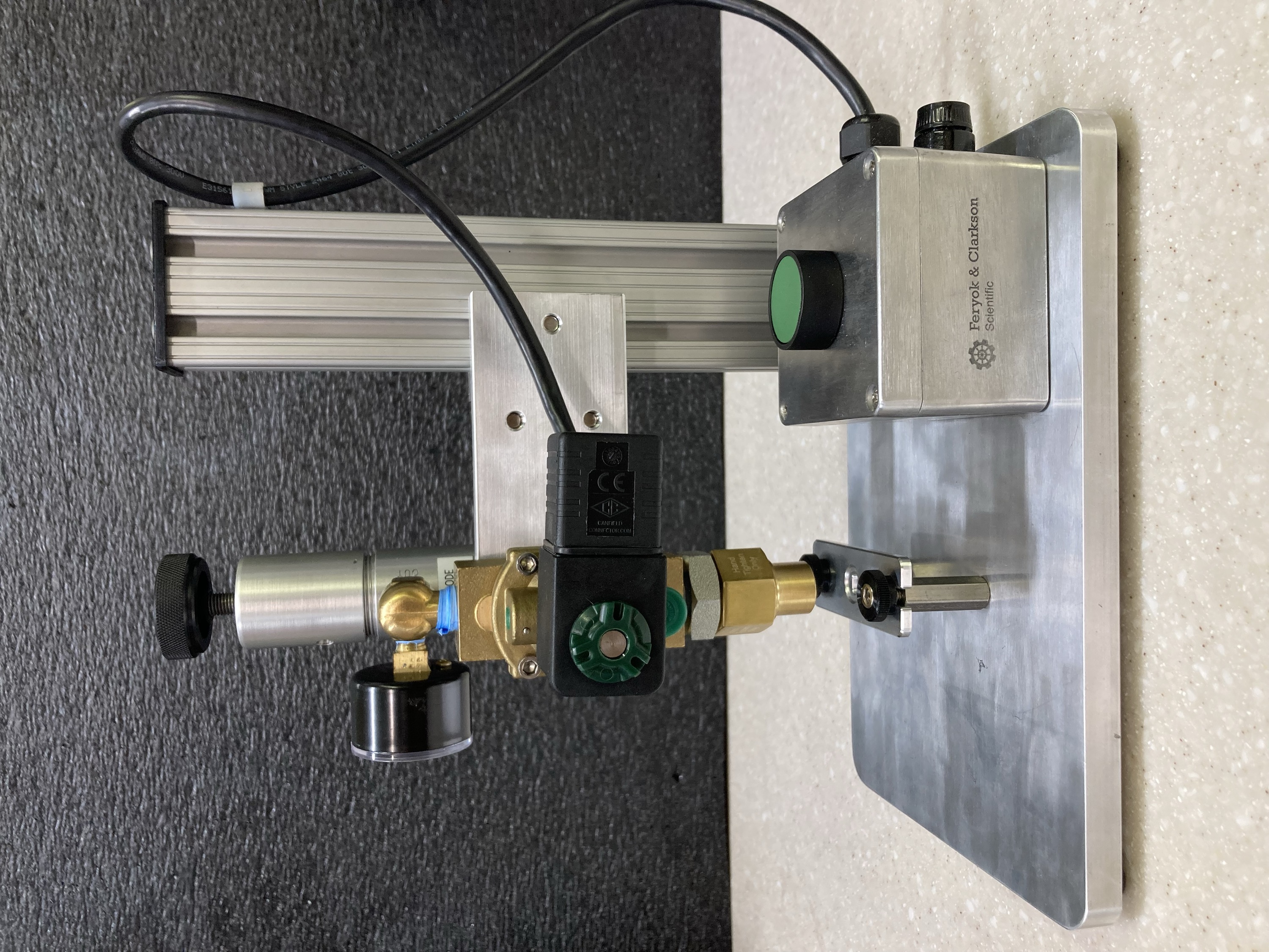 Side view of unit showing trigger button