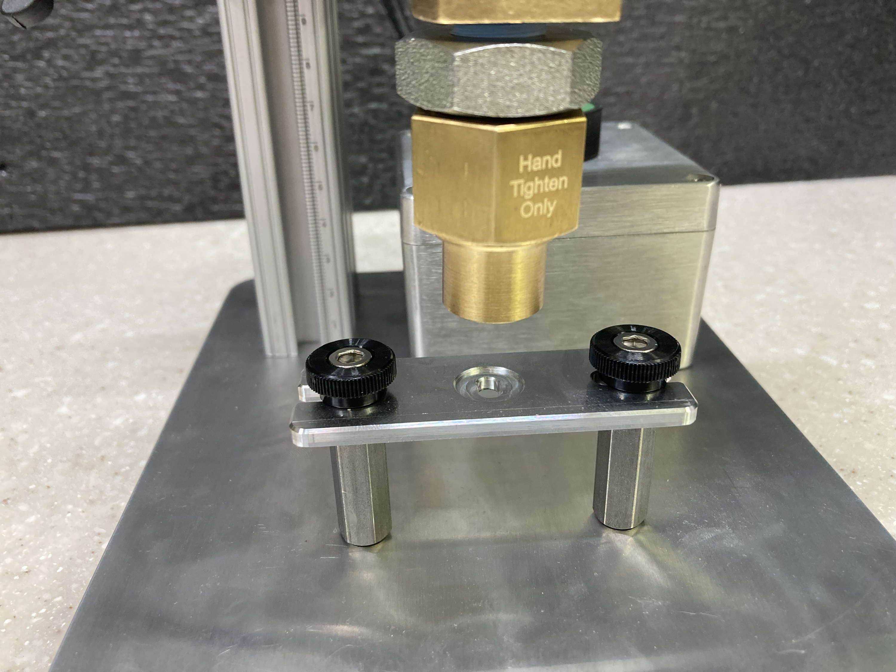 Nozzle and target platen